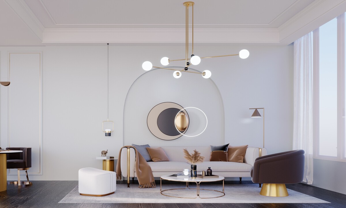 Arched plaster niche behind a sofa with a sculptural gold wall disc